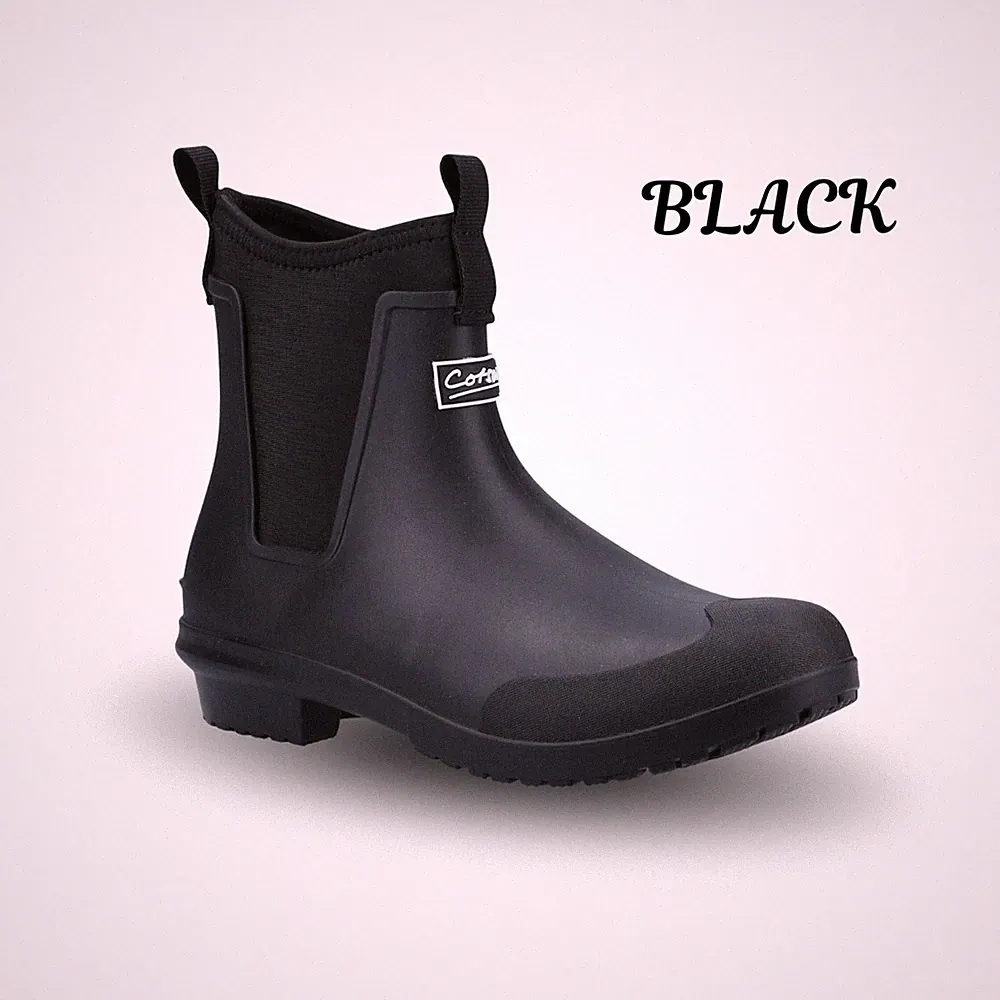 Lila Reitgummistiefel